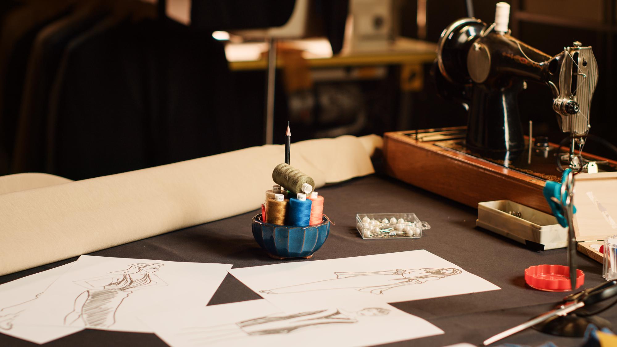 workbench with threads and sketches